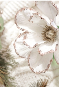 Detailed macro view of a 25cm white Christmas flower with rose gold glitter on petals