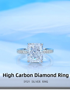 Macro shot of S925 silver ring featuring radiant cut rectangular main stone with side diamonds