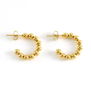 Detail of 18K gold-plated stainless steel bead hoop earrings on a clean white background