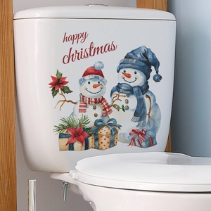 Christmas snowman wall sticker featuring happy christmas text and gift boxes on toilet tank