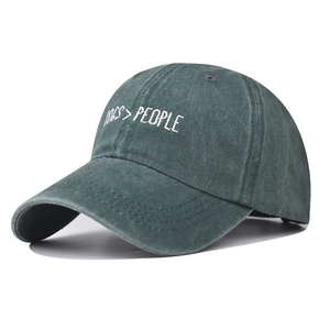 Detail of washed cotton baseball cap with white DOGS > PEOPLE embroidery and curved brim