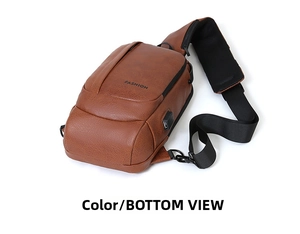 Detailed bottom view of brown leather chest bag showing USB port and premium texture