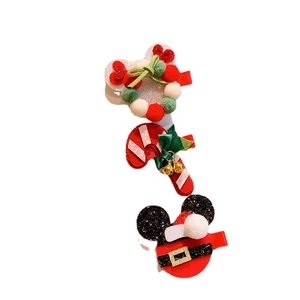 Three-piece Christmas reindeer antler hair clips with glitter ears and candy cane designs