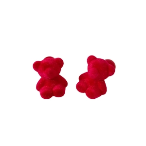 Minimalist red flocked bear stud earrings with silver pins for women on white background