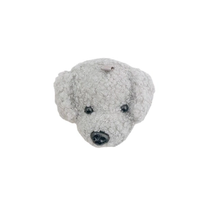 Cute grey teddy plush dog pendant with curly faux fur and a hanging loop on white background