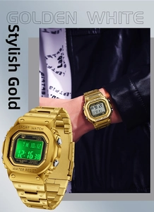 Macro shot of gold square digital sports watch with green LED backlight display