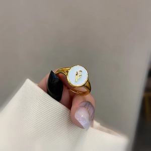 S925 silver 18k gold plated ring with round shell base and golden tulip flower design