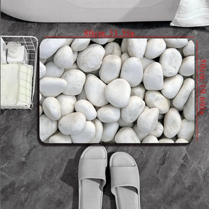Detail shot of 31.5x19.69 inch pebble pattern bath mat on marble bathroom floor