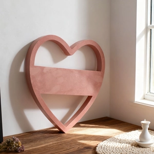 Modern hollow heart-shaped resin mold in matte rose gold for DIY home wall decor