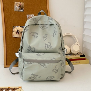 Pale green butterfly print backpack with multiple pockets for school and casual travel