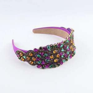 Baroque purple headband with colorful rhinestones and crystals on white background