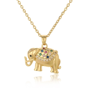 Macro detail of golden elephant pendant featuring vibrant multi-colored zircon stones