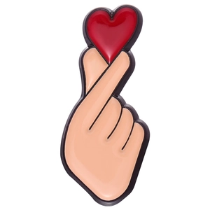 Creative heart gesture enamel pin with a red heart and golden metallic finish badge