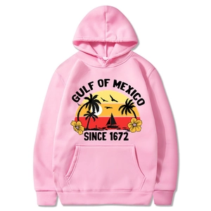 Pink oversized hoodie featuring Gulf of Mexico tropical landscape print on a plain white background