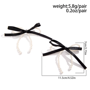 Detail view of black silk bow earrings with faux pearls and size dimensions included