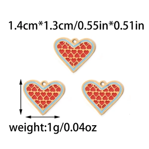 Detail showing 304 stainless steel heart charms with blue border and 1.4cm dimensions