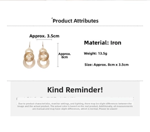 Detail view of gold layered geometric round earrings with material and size specifications