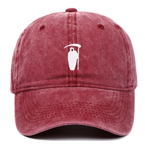 Detailed view of white Grim Reaper embroidery on vintage washed burgundy baseball cap