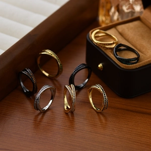 Cross-shaped S925 sterling silver rings with micro-pave zircons in gold, silver, and black