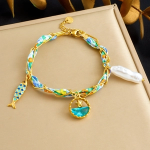 Bracelet tissé en acier inoxydable doré avec breloques dauphin et perles baroques