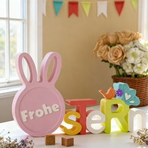 Easter rabbit wooden plaque with colorful Frohe Ostern letters and bird ornaments