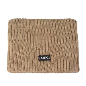 Knitted khaki wide headband with black RANK brand label for versatile daily hair styling