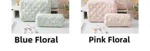 Close-up of floral quilted toiletry bags in pink and blue patterns with soft cotton texture