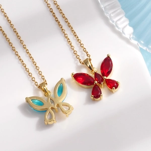 Elegant gold titanium steel butterfly pendant necklaces with red and blue crystals