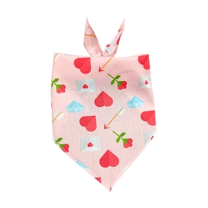 Pink cotton Valentine's Day dog bandana with heart and rose prints on white background