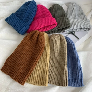 Minimalist knit beanie hats in multiple solid colors for autumn and winter warmth