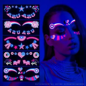UV reactive USA Independence Day face tattoos with glowing flag and star designs