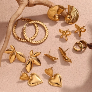 Detailed collection of 18K gold plated earrings with fan-shaped and heart designs