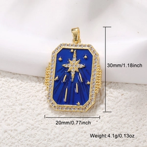 Golden tarot pendant with blue enamel, star motif and zircon inlays on white background