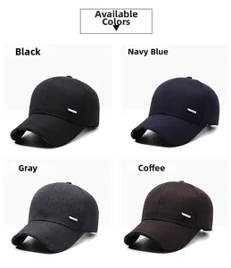 Close-up of winter baseball caps in black, navy, grey, and coffee colors with sports print
