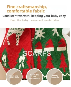 Detail of red and green knitted Christmas scarves featuring reindeer and snowflake patterns