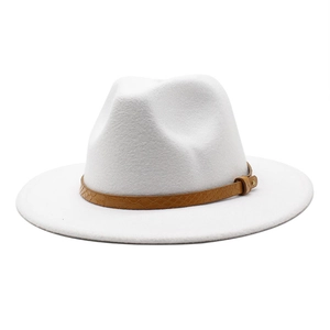 Detail of white felt fedora hat featuring a brown snakeskin band and metallic buckle