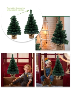 Detail of 60cm mini artificial Christmas tree with burlap base in home setting