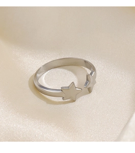 Detail of silver stainless steel adjustable open ring with dual pentagram stars