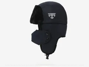 Detail of navy blue winter trapper hat with black faux fur lining and ear flaps