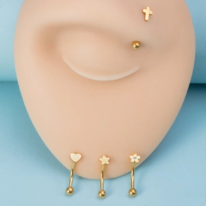 Golden stainless steel piercing studs set with cross, heart, star and flower shapes