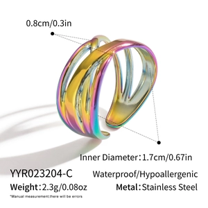 Macro detail of rainbow stainless steel adjustable ring with multi-layer wavy design