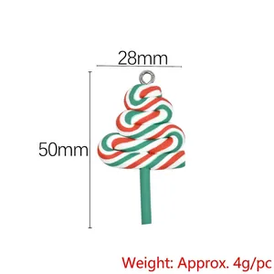 Detail view of a red and green Christmas tree lollipop pendant with DIY metal loop