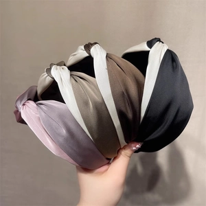 Elegant wide knotted headbands in silk satin texture with stylish crisscross design