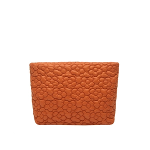Orange quilted floral handbag with 3D embroidery made of water-resistant nylon fabric