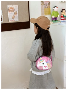 Pink unicorn crossbody bag for girls featuring glitter horn and soft mesh mane detail