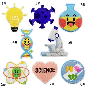 Detail view of 8-piece science theme embroidery patches including microscope and DNA icons
