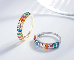 Macro shot of S925 silver rainbow gemstone rings in gold and silver plating