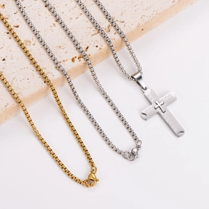 Men's stainless steel box chain necklace with textured cross pendant in gold and silver