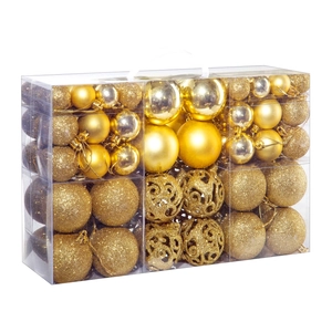 Detail of gold Christmas ball ornaments with glossy, matte and hollowed textures