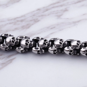 Macro shot of punk skull bracelet showing intricate silver stainless steel metal details